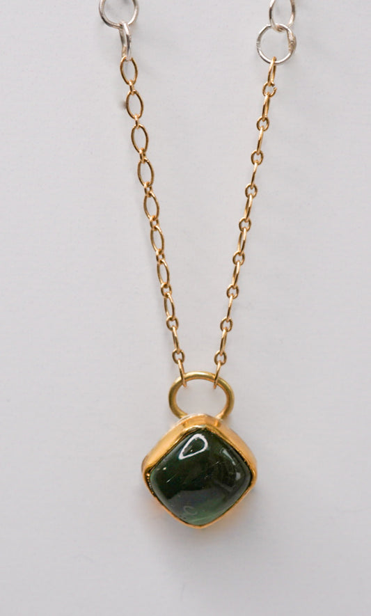 Green tourmaline, gold, and silver necklace