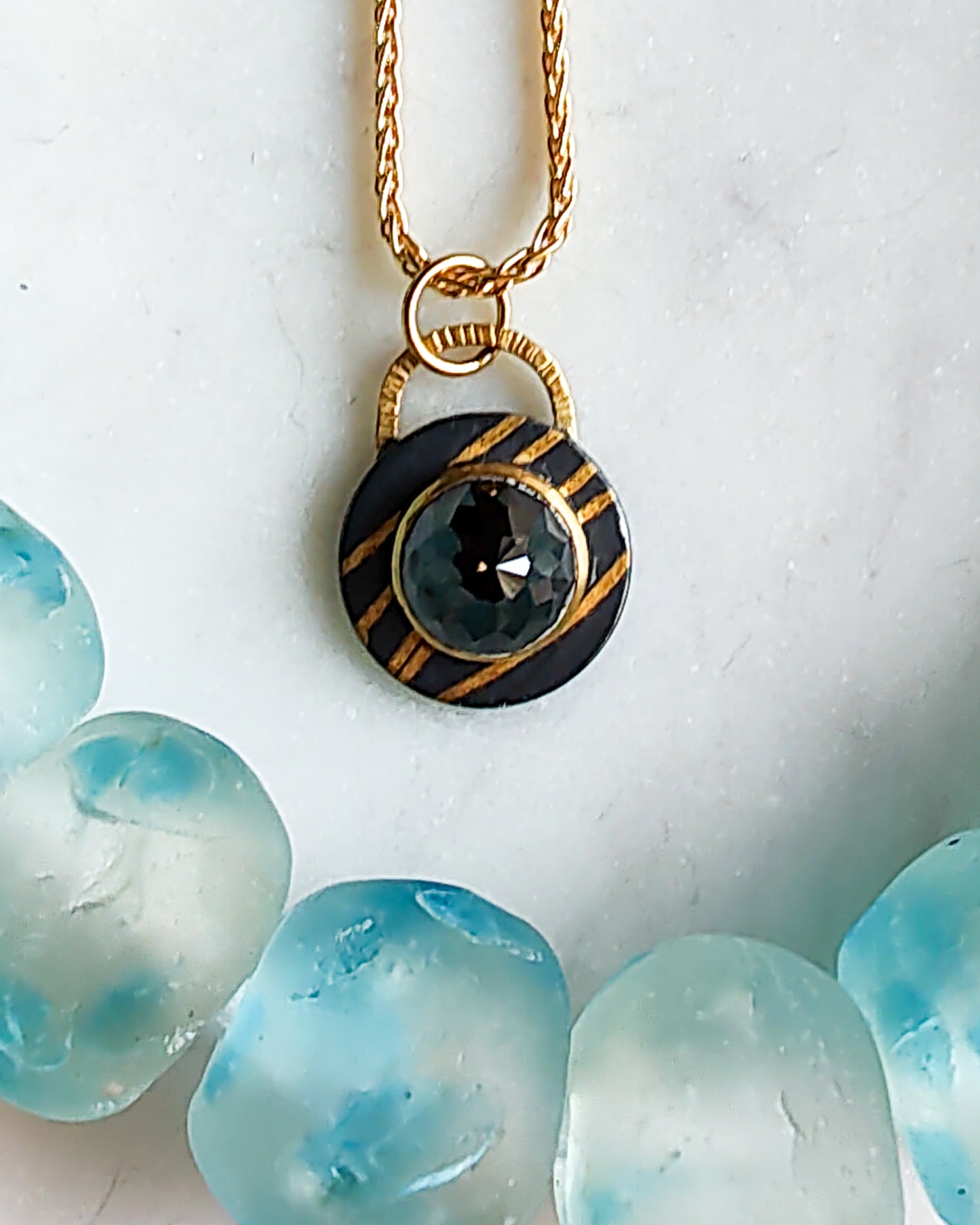 Black Diamond Gold Ribbon Pendant