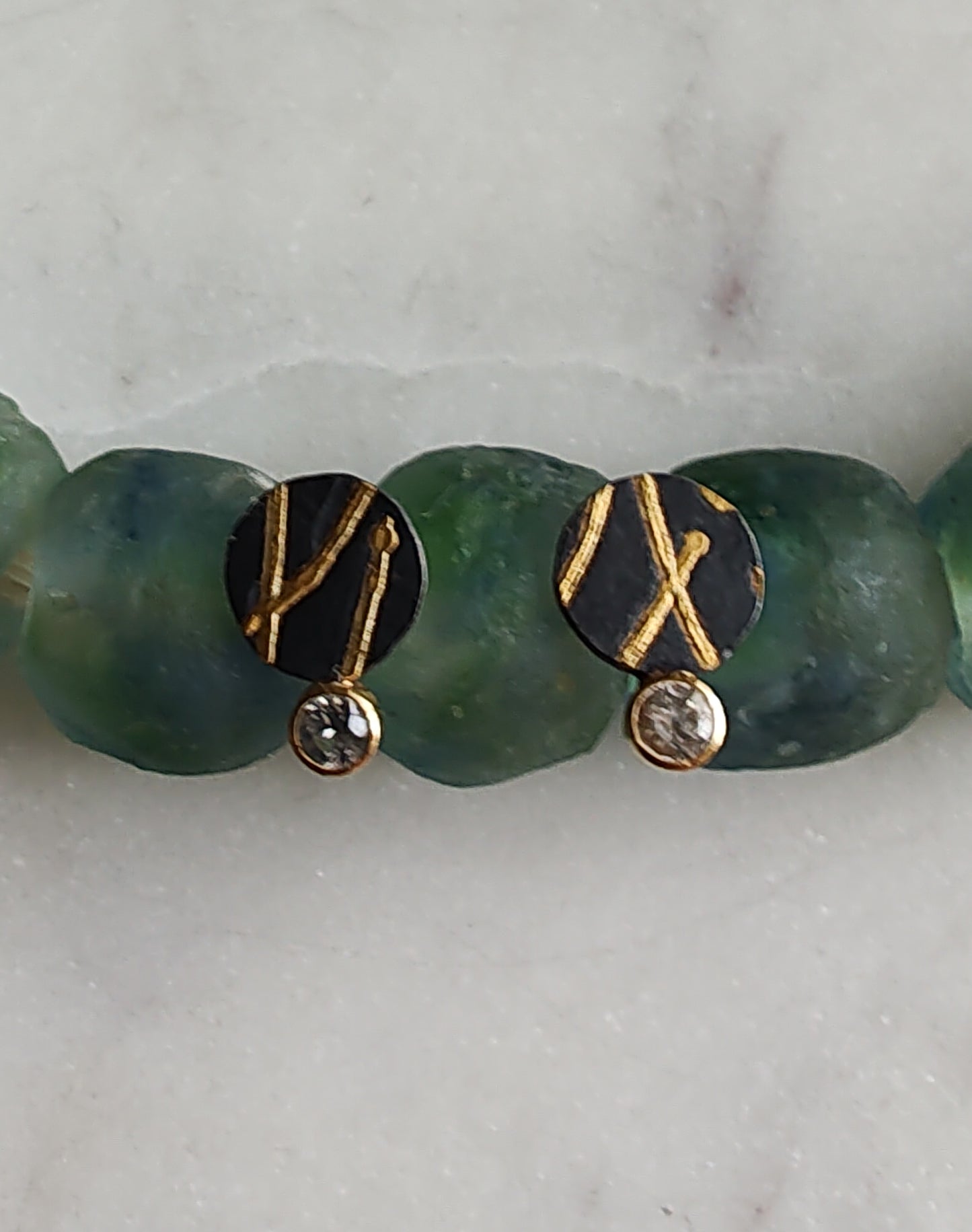 White Sapphire Black and Gold Ribbon Studs