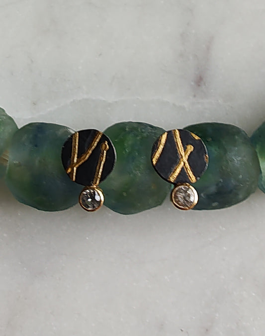 White Sapphire Black and Gold Ribbon Studs